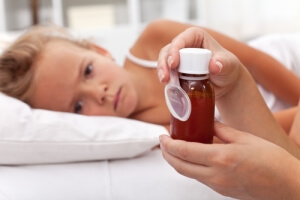 How to Keep a Child From Spitting Out Medicine